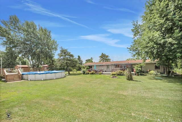 944 E County Line Rd, Beecher, IL 60401 - view of grassy yard featuring a deck and a covered pool