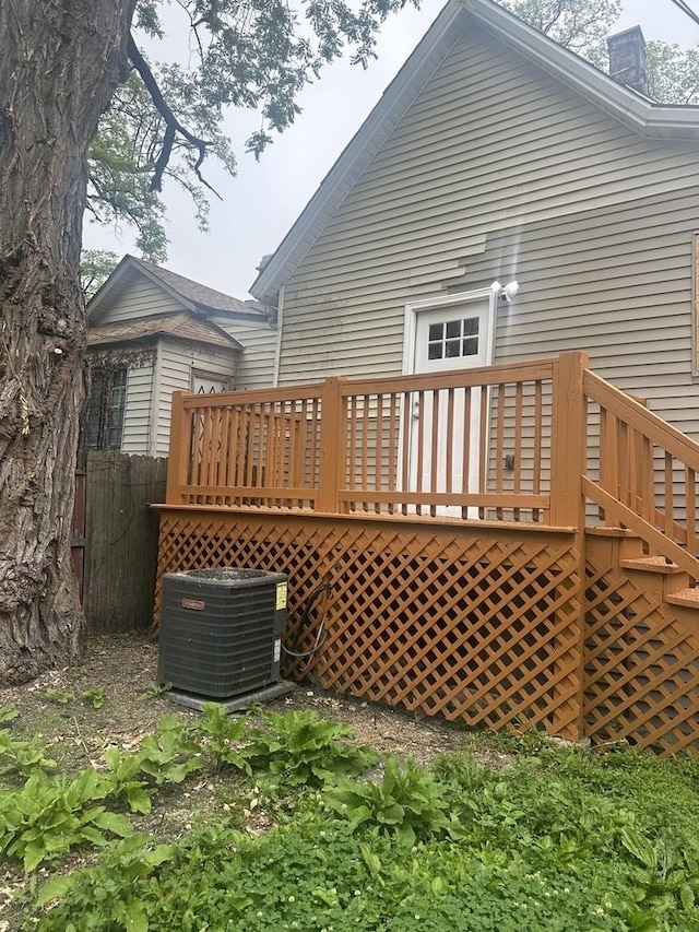 7618 S Drexel Ave, Chicago, IL 60619 - back of house with a chimney, a wooden deck, and stairway