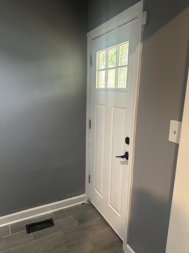 7618 S Drexel Ave, Chicago, IL 60619 - doorway to outside with dark wood finished floors and baseboards