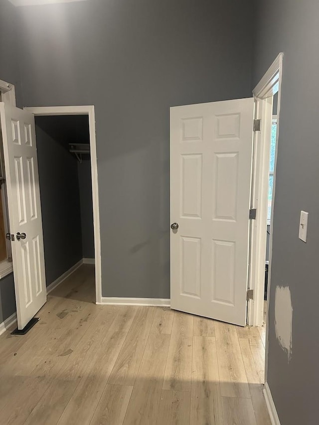 7618 S Drexel Ave, Chicago, IL 60619 - unfurnished bedroom featuring light wood-style flooring