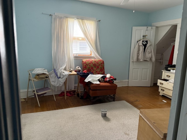 7005 34th St, Berwyn, IL 60402 - living area with wood finished floors and ceiling fan
