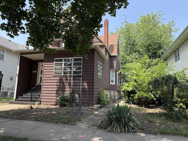 7005 34th St, Berwyn, IL 60402 - view of front of home with a chimney