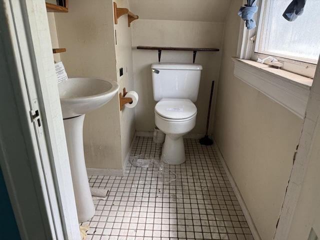 7005 34th St, Berwyn, IL 60402 - half bathroom featuring toilet and tile patterned floors