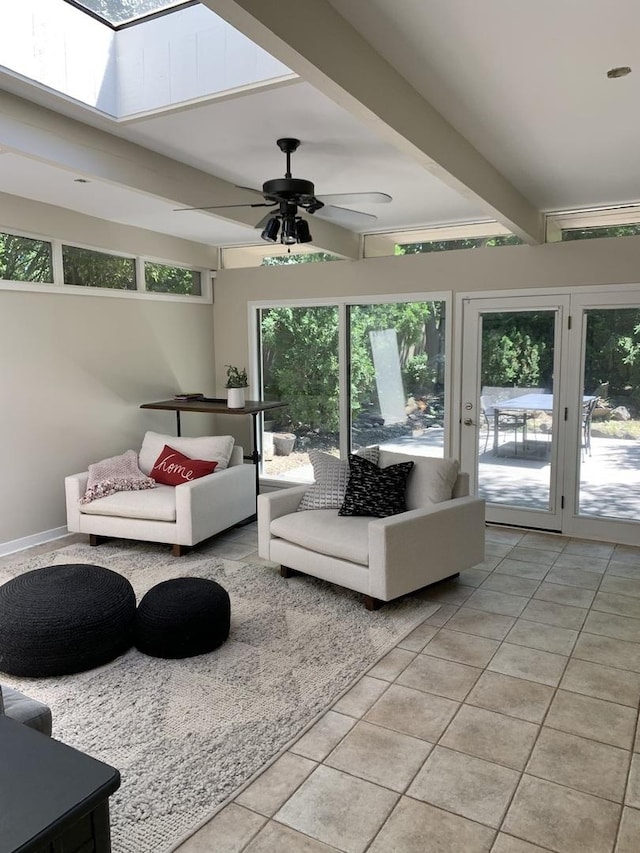 743 Dundee Ave, Barrington, IL 60010 - living area featuring light tile patterned floors, ceiling fan, a skylight, and beamed ceiling