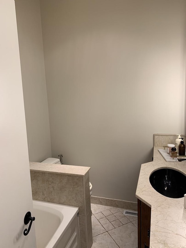 743 Dundee Ave, Barrington, IL 60010 - bathroom featuring a bath, vanity, and tile patterned floors
