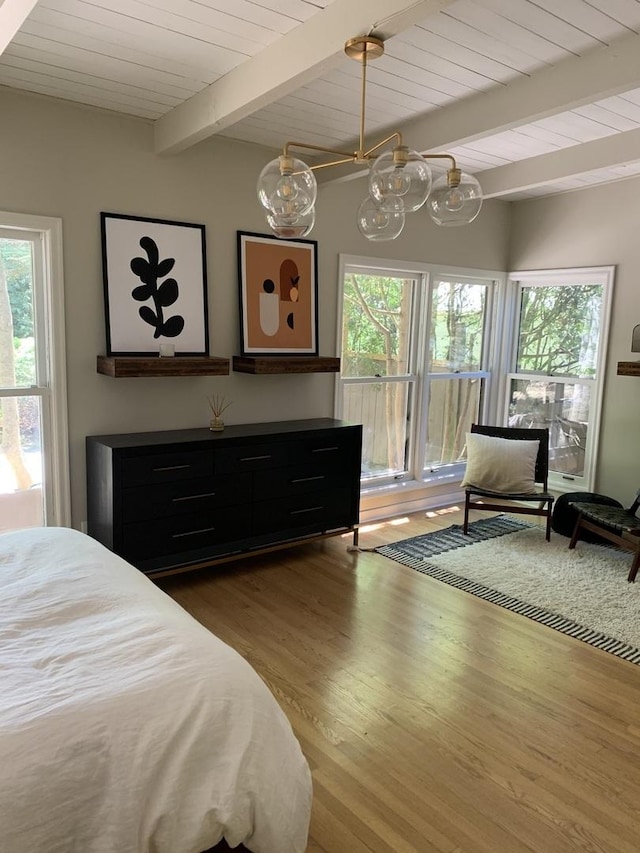 743 Dundee Ave, Barrington, IL 60010 - bedroom featuring wood finished floors, multiple windows, a wooden ceiling with exposed beams, and a chandelier