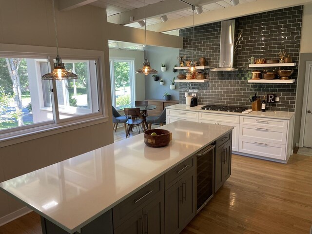 743 Dundee Ave, Barrington, IL 60010 - kitchen with wine cooler, gas cooktop, open shelves, wall chimney range hood, and tasteful backsplash
