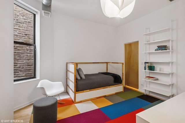 1525 N Milwaukee Ave Unit 3, Chicago, IL 60622 - bedroom with wood finished floors and baseboards