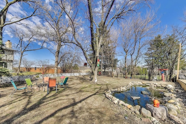 810 Woodhollow Ln, Buffalo Grove, IL 60089 - view of yard featuring a garden pond