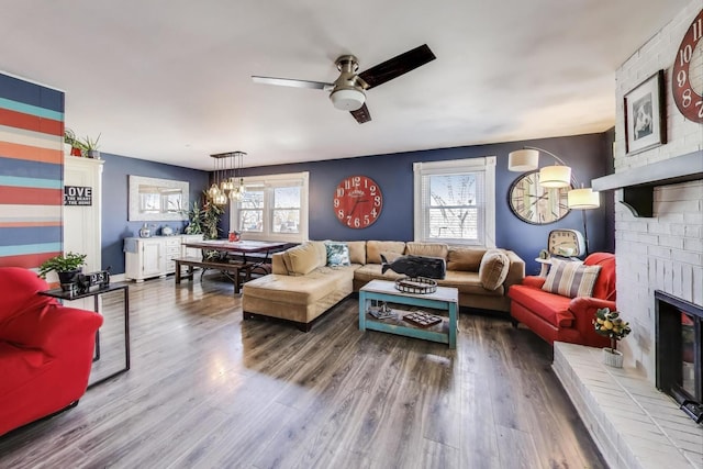 810 Woodhollow Ln, Buffalo Grove, IL 60089 - living area with a fireplace, ceiling fan, and wood finished floors