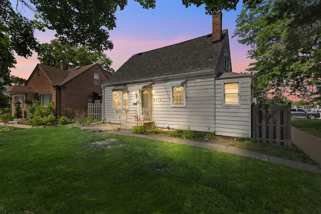 2808 Elder Ln, Franklin Park, IL 60131 - view of front of home featuring roof with shingles and a chimney