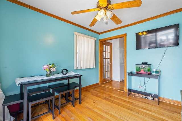 2808 Elder Ln, Franklin Park, IL 60131 - dining space featuring wood finished floors, crown molding, and ceiling fan