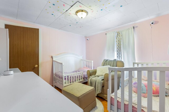 2808 Elder Ln, Franklin Park, IL 60131 - bedroom with crown molding and wood finished floors