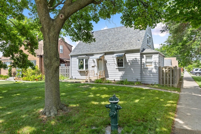 2808 Elder Ln, Franklin Park, IL 60131 - cape cod-style house featuring roof with shingles