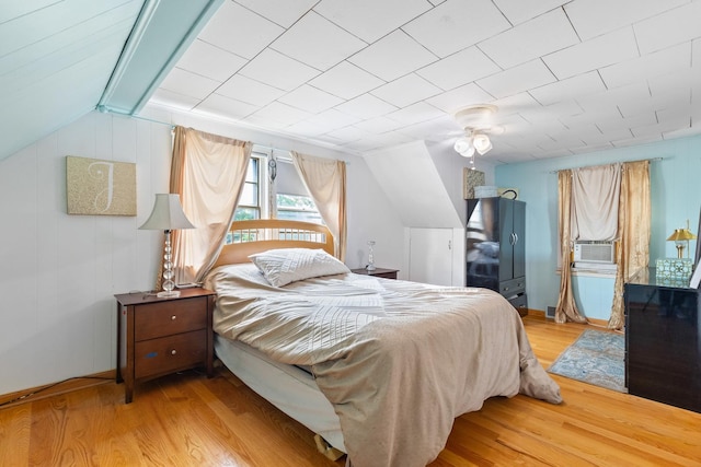 2808 Elder Ln, Franklin Park, IL 60131 - bedroom with light wood-style floors, vaulted ceiling, and cooling unit