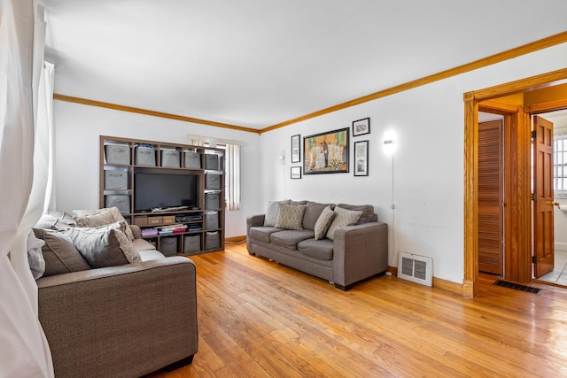2808 Elder Ln, Franklin Park, IL 60131 - living room featuring light wood-type flooring and crown molding