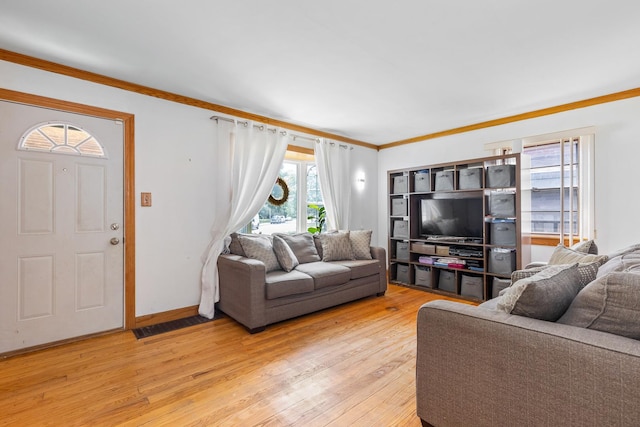 2808 Elder Ln, Franklin Park, IL 60131 - living area featuring light wood-style flooring and crown molding
