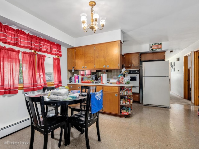 6737 W Lloyd Dr, Worth, IL 60482 - dining space featuring a chandelier, light floors, and a baseboard radiator