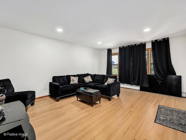 6737 W Lloyd Dr, Worth, IL 60482 - living room featuring baseboard heating, light wood-style flooring, and recessed lighting