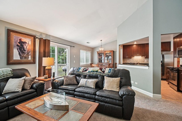 1604 Brittany Ct Unit 2B, Wheeling, IL 60090 - living room with a chandelier, vaulted ceiling, light colored carpet, and light tile patterned floors