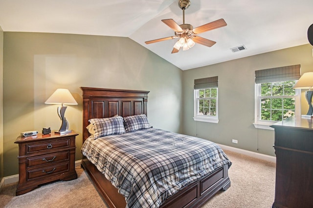 1604 Brittany Ct Unit 2B, Wheeling, IL 60090 - bedroom with light colored carpet, vaulted ceiling, and a ceiling fan