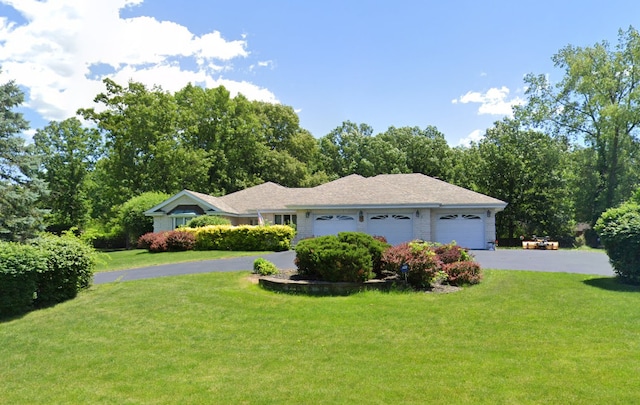 24029 S Plum Valley Dr, Crete, IL 60417 - view of front of home with driveway, a garage, and a front yard