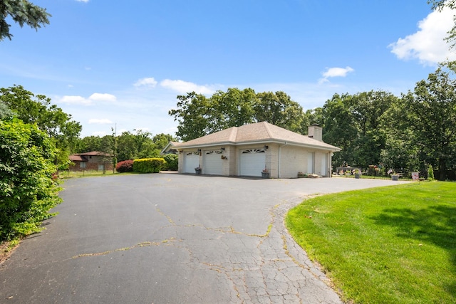 24029 S Plum Valley Dr, Crete, IL 60417 - garage featuring asphalt driveway