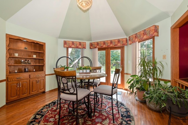 24029 S Plum Valley Dr, Crete, IL 60417 - dining space featuring wood-type flooring, healthy amount of natural light, and high vaulted ceiling