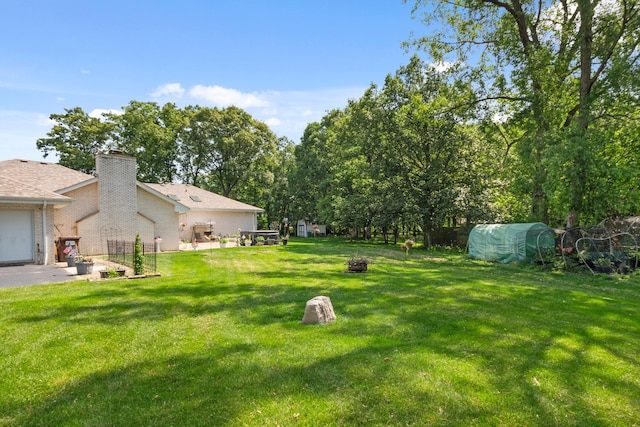 24029 S Plum Valley Dr, Crete, IL 60417 - view of green lawn with a fire pit