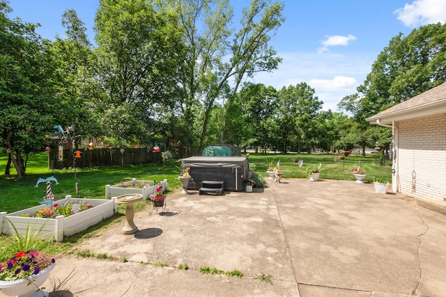 24029 S Plum Valley Dr, Crete, IL 60417 - view of patio / terrace featuring a hot tub and a vegetable garden
