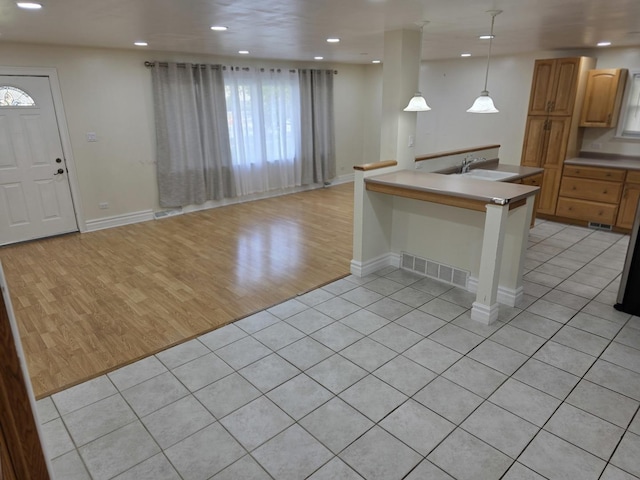 17936 66th Ave, Tinley Park, IL 60477 - kitchen with open floor plan, light wood-style flooring, recessed lighting, pendant lighting, and a kitchen breakfast bar