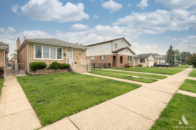 7707 Moody Ave, Burbank, IL 60459 - view of front of home with brick siding and a gate