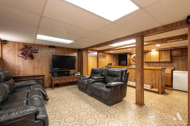 7707 Moody Ave, Burbank, IL 60459 - living room with a drop ceiling, wooden walls, and wet bar