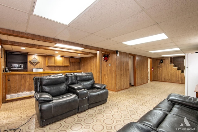 7707 Moody Ave, Burbank, IL 60459 - cinema room featuring wooden walls, bar, and a paneled ceiling