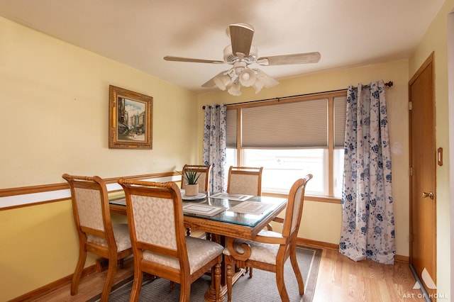 7707 Moody Ave, Burbank, IL 60459 - dining room with light wood-style flooring and ceiling fan