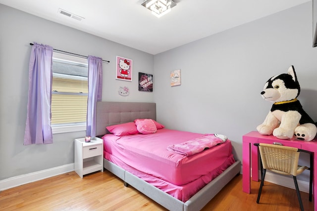 1715 N 15th Ave, Melrose Park, IL 60160 - bedroom featuring wood finished floors and baseboards