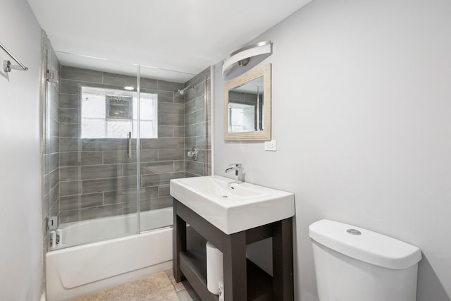 1715 N 15th Ave, Melrose Park, IL 60160 - bathroom featuring vanity and bath / shower combo with glass door