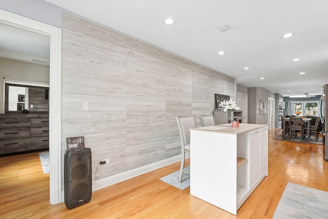 1715 N 15th Ave, Melrose Park, IL 60160 - kitchen with an accent wall, recessed lighting, freestanding refrigerator, open shelves, and light wood finished floors