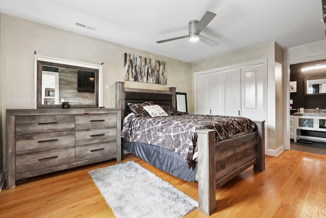 1715 N 15th Ave, Melrose Park, IL 60160 - bedroom with wood finished floors, a closet, and ceiling fan