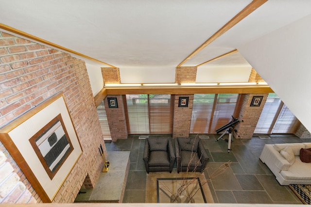 1200 Regency Ln, Lake Forest, IL 60045 - living room featuring plenty of natural light and brick wall