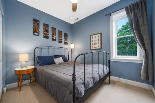 4259 N Ashland Ave Unit 2, Chicago, IL 60613 - carpeted bedroom featuring baseboards and a ceiling fan