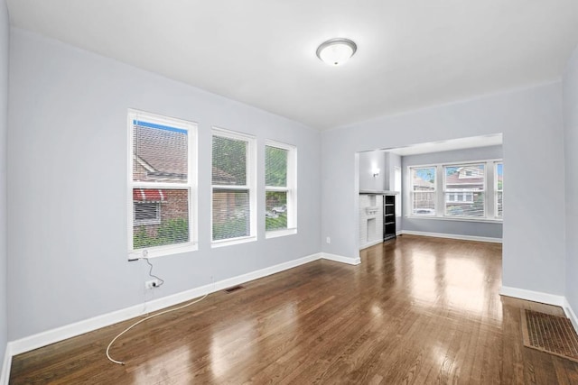8521 S Loomis Blvd, Chicago, IL 60620 - unfurnished living room with wood finished floors and baseboards