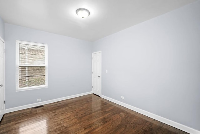 8521 S Loomis Blvd, Chicago, IL 60620 - spare room featuring wood finished floors
