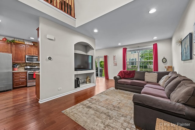 392 S Jade Ln, Round Lake, IL 60073 - living area with dark wood-style floors and recessed lighting