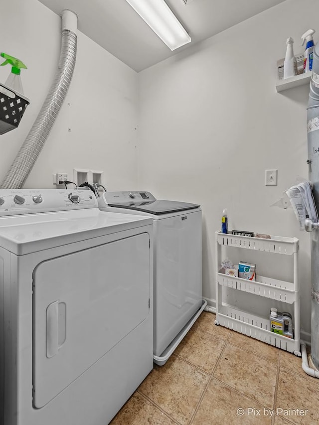 392 S Jade Ln, Round Lake, IL 60073 - laundry room with separate washer and dryer and light tile patterned floors
