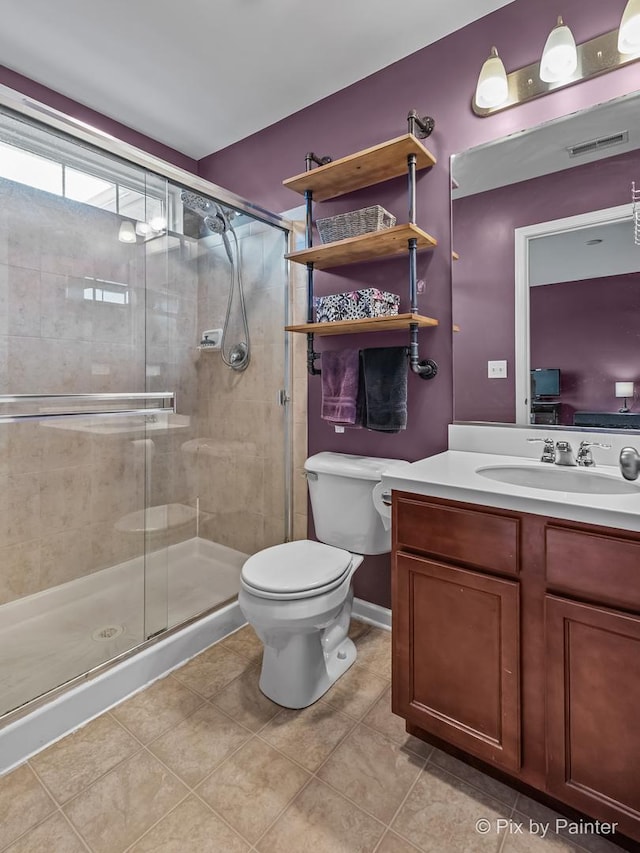 392 S Jade Ln, Round Lake, IL 60073 - bathroom with tile patterned flooring, vanity, and a shower stall