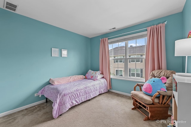392 S Jade Ln, Round Lake, IL 60073 - carpeted bedroom featuring baseboards