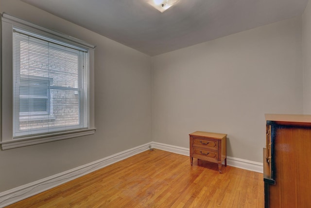 4934 N Marmora Ave, Chicago, IL 60630 - spare room featuring light wood-style flooring and baseboards