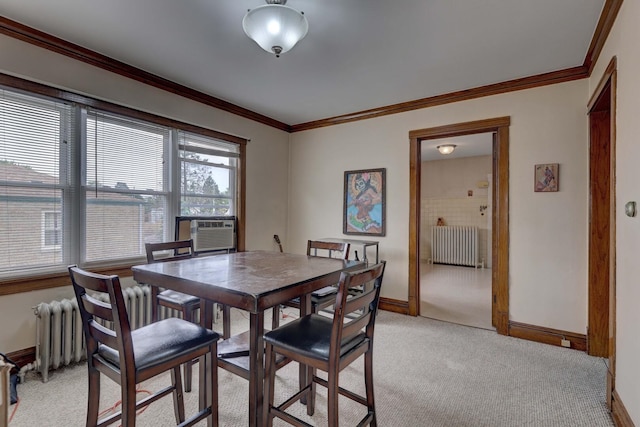 4934 N Marmora Ave, Chicago, IL 60630 - dining room featuring radiator, light colored carpet, ornamental molding, and cooling unit
