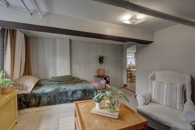 4934 N Marmora Ave, Chicago, IL 60630 - bedroom featuring carpet, radiator, and wood walls